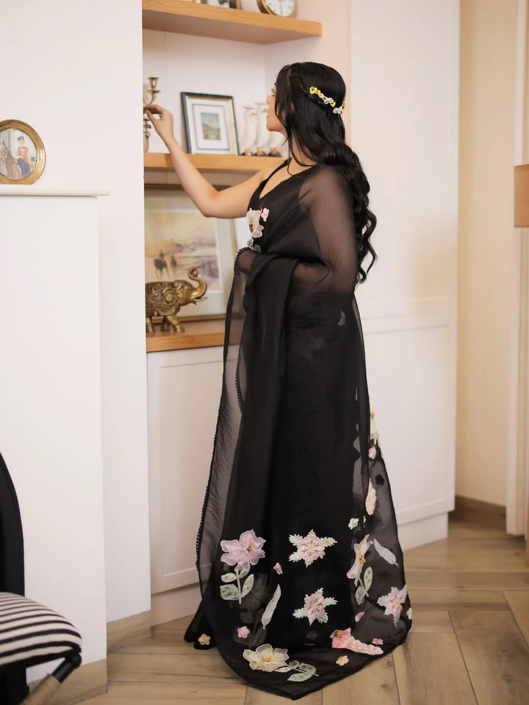 Like flowers on the night sky 🌸🌌

Wearing ‘Night Petals’ by @siahbyahadishika 🫶🏻 This Saree sold out in about 30 minutes after we dropped the collection. But there were SO many requests that we had to bring it back. We have currently opened limited pre-orders on the website and it wouldn’t be open for long. So if you’d like to have one of it, runnnnn to the website 🖤

Shop now at - www.siahbyahadishika.com ✨

Night Petals - fresh & radiant, this glass tissue saree in a black shade adorned with multi-colour hand-worked 3D appliqué flowers is a sure head-turner. The flowers are appliqué pasted, which gives a strikingly different vibe to this saree. If a saree could blend together youthful zest and a poetic old world charm, this is that saree. Ahaana has paired the saree along with a black plain blouse while the original blouse is in the same glass tissue fabric and has appliqué flowers on it. If your wardrobe needed a saree that's simple and easy, yet leaves a strong mark - you need this one!

#SiahByAhadishika 🌸🖤

Hair @pooja_vysh_makeovers 
Saree Draping @pournami_makeovers @dev_ik_aa_a 
Location @paradise_luxury_villa 
Shot by @_mathews_photography 

✨