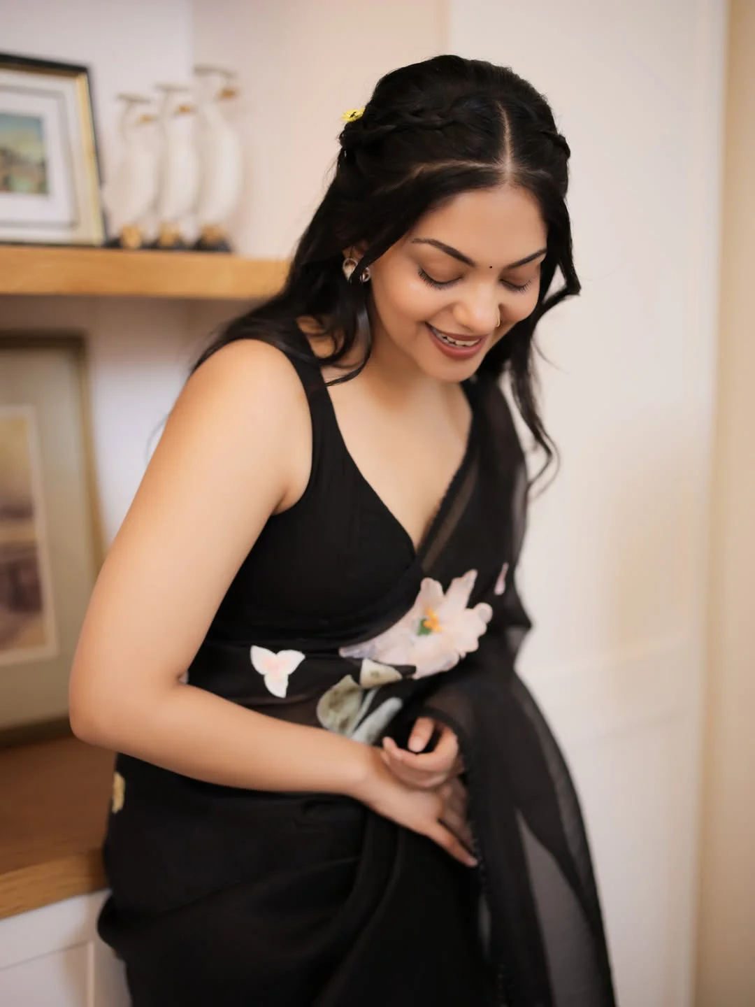 Like flowers on the night sky 🌸🌌

Wearing ‘Night Petals’ by @siahbyahadishika 🫶🏻 This Saree sold out in about 30 minutes after we dropped the collection. But there were SO many requests that we had to bring it back. We have currently opened limited pre-orders on the website and it wouldn’t be open for long. So if you’d like to have one of it, runnnnn to the website 🖤

Shop now at - www.siahbyahadishika.com ✨

Night Petals - fresh & radiant, this glass tissue saree in a black shade adorned with multi-colour hand-worked 3D appliqué flowers is a sure head-turner. The flowers are appliqué pasted, which gives a strikingly different vibe to this saree. If a saree could blend together youthful zest and a poetic old world charm, this is that saree. Ahaana has paired the saree along with a black plain blouse while the original blouse is in the same glass tissue fabric and has appliqué flowers on it. If your wardrobe needed a saree that's simple and easy, yet leaves a strong mark - you need this one!

#SiahByAhadishika 🌸🖤

Hair @pooja_vysh_makeovers 
Saree Draping @pournami_makeovers @dev_ik_aa_a 
Location @paradise_luxury_villa 
Shot by @_mathews_photography 

✨